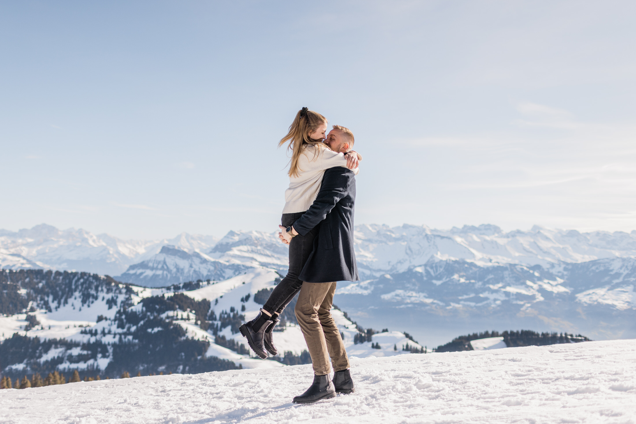 Couple engagement session in snow Mount Rigi Switzerland”